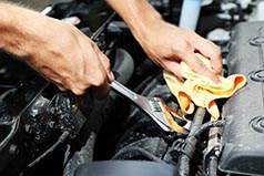 Mechanic working on vehicle in las chula-vista